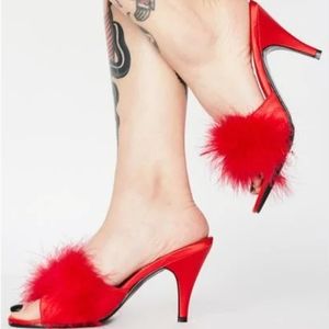 Red fluffy feathered heels
